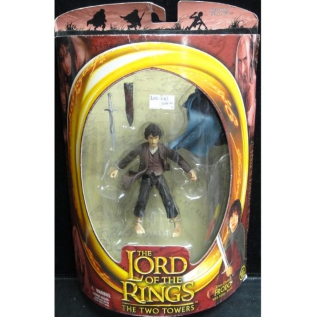 TOY BIZ 81167 THE LORD OF THE RINGS THE FELLOWSHIP OF THE RING ELVEN CLOAKED FRODO WITH STING SWORD ELIJAH WOOD b641644