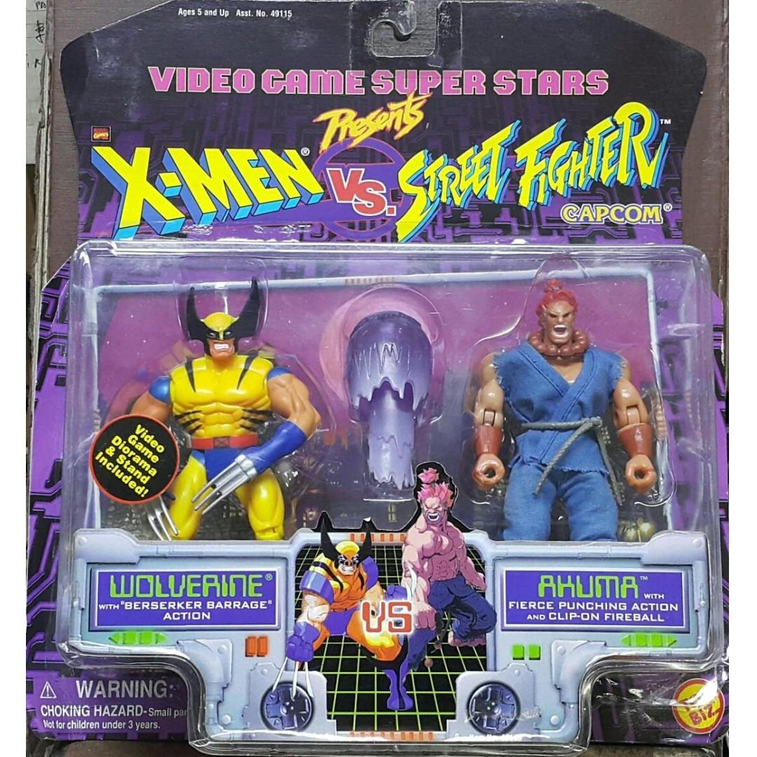 TOY BIZ 49116 X-MEN VS CAPCOM STREET FIGHTER WOLVERINE VS AKUMA VIDEO GAME SUPER STARS PRESENTS MARVEL COMICS