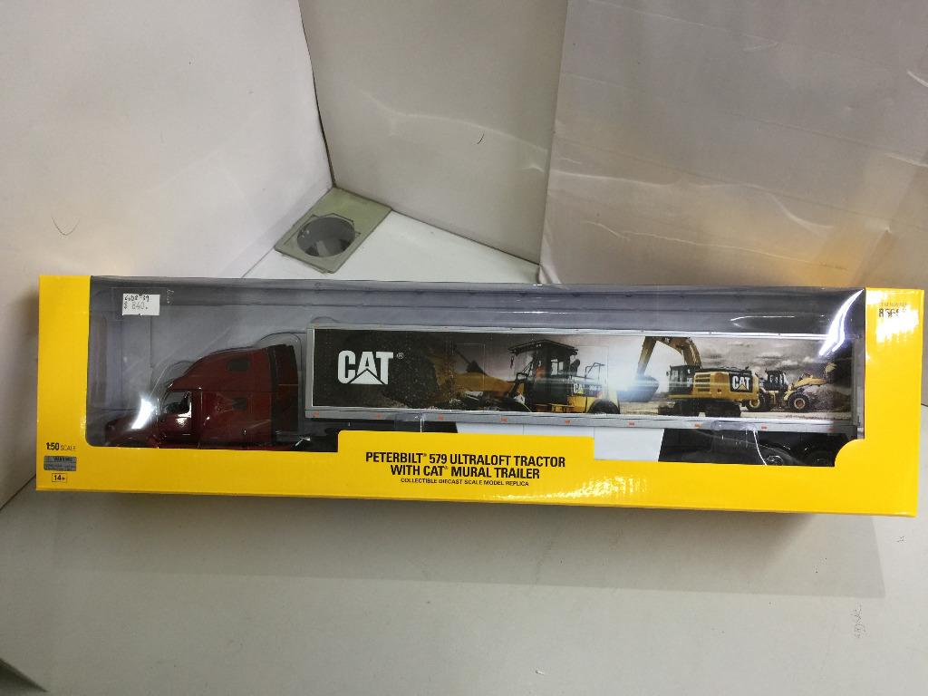 DIECAST MASTERS 1/50 Peterbilt 579 Ultraloft Tractor with Cat Mural Trailer