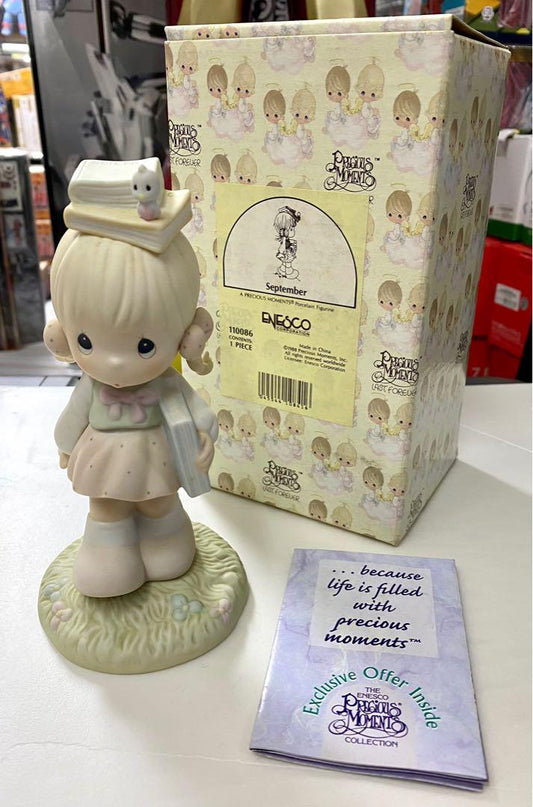 ENESCO PRECIOUS MOMENTS PORCELAIN FIGURINE - SEPTEMBER 16CM TALL