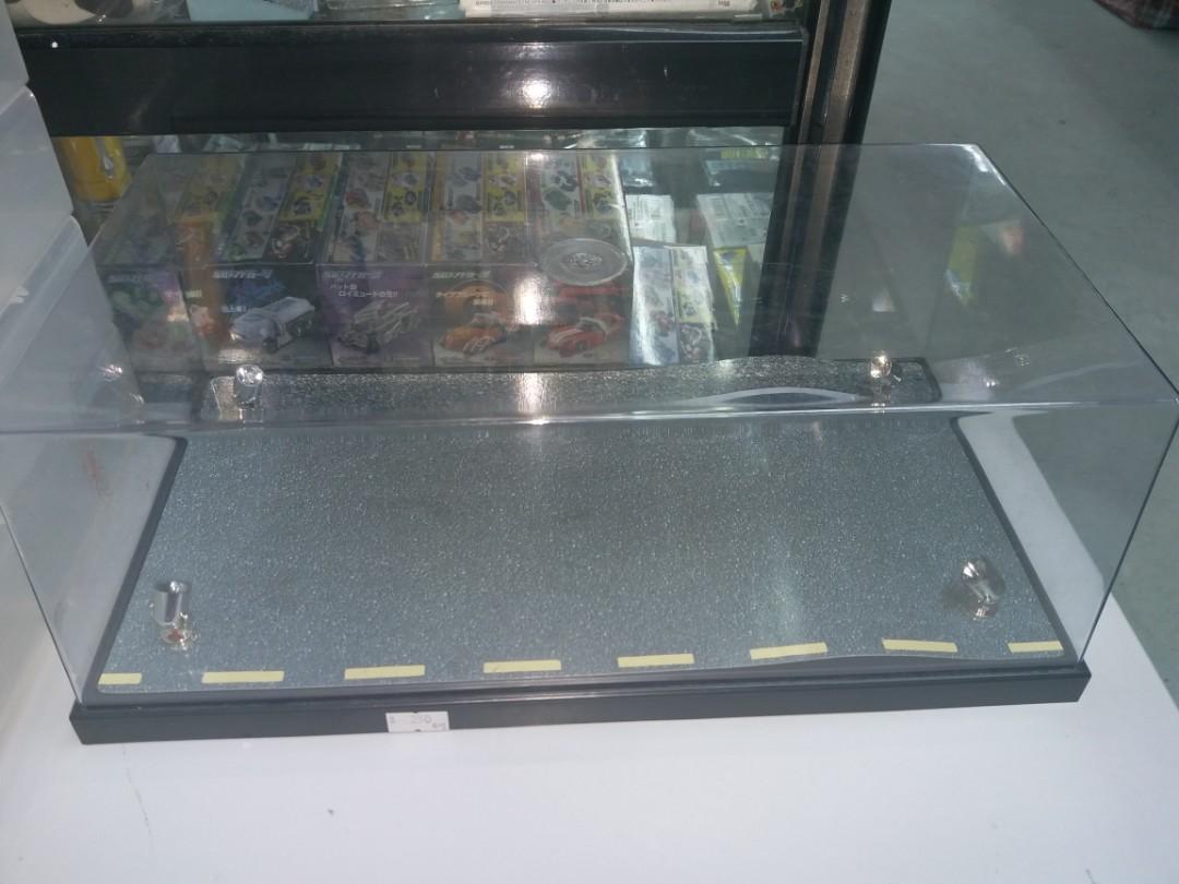 Transparent plastic box for toys display. Lights installed. External power supply required.